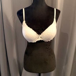 BRAND NEW XOXO 38C white lace padded bra. Adjustable straps.